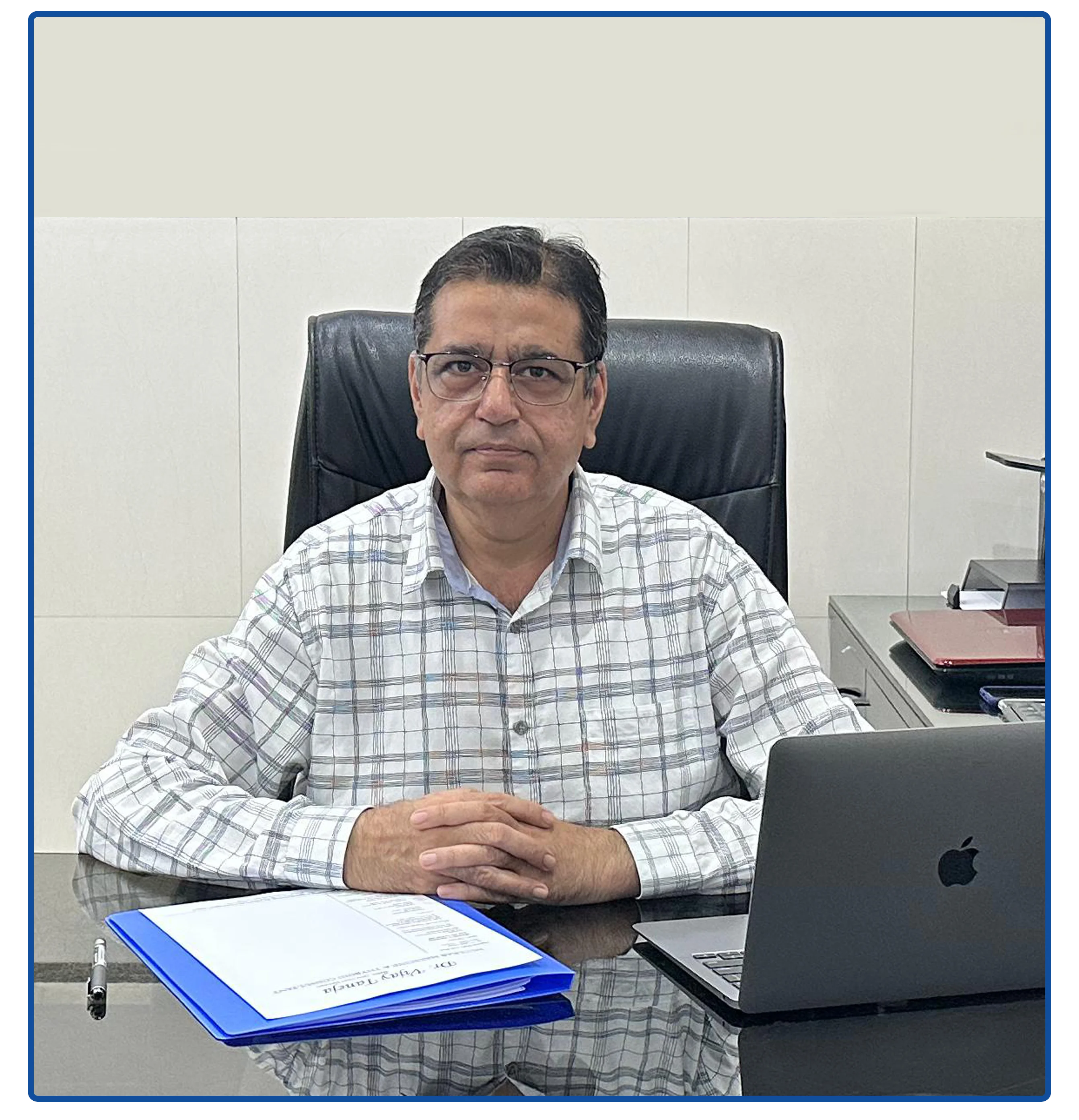 Dr. Vijay Taneja